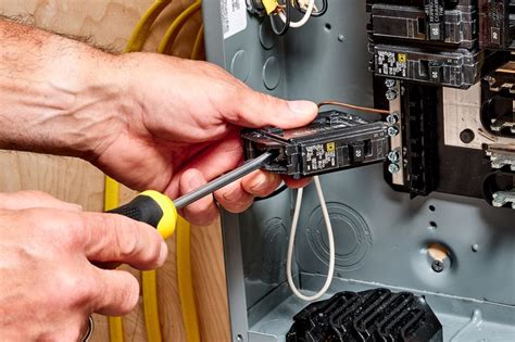 electrician training in replacing main electrical box circuit breaker|how to change electrical breaker.